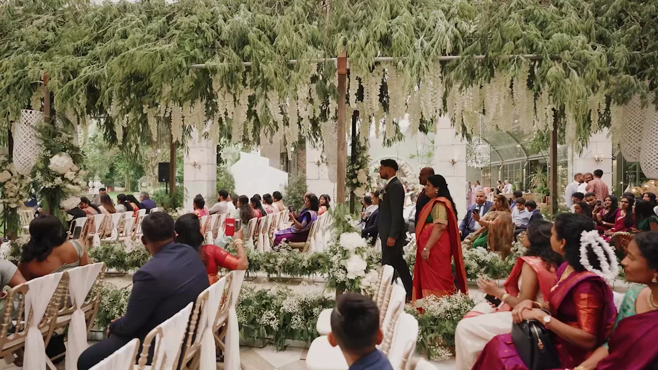 Outdoor ceremony under hanging wisteria at Solar da Levada, wedding film by VIP Weddings Films